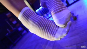 Flying feet in white nylon socks POV