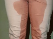 Sexy Girl totally wetting her cute pink Jean's on purpose! Hot!