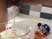 Request to pee in measuring cup