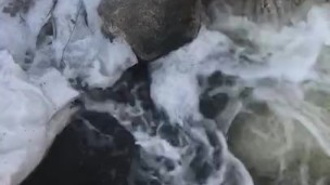 Pissing off a bridge in broad daylight
