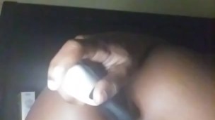 Petite Ebony Playing With Toy 