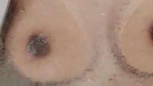 Small wet tits against shower doors 