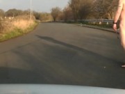 Naked in road with pump on
