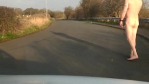 Naked in road with pump on