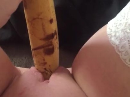 Teen fucks her tight little pussy with a banana & squirts everywhere