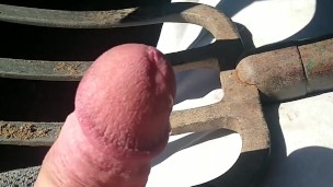Farm boy jerks off in truck and then cums on pitchfork