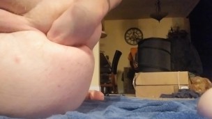 Stuffing a large toy in my ass followed by my fist. 