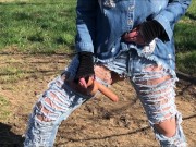 Outdoor play with her pierced and tattooed pussy in jeans 1/16
