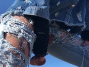 Outdoor play with her pierced and tattooed pussy in jeans 2/16