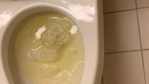 Teen pisses and play with his dick in work bathroom