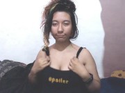 E-girl massages her head and shakes her breasts, they jump out ..