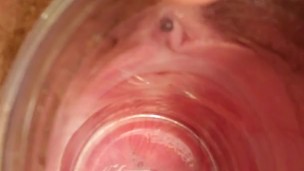 Looking inside a loose pussy with a transparent glass