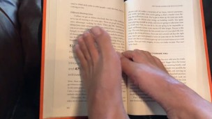 Sexy Feet Reading a Book on a Rainy Day