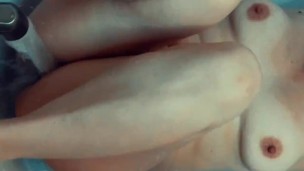 Curvy MILF washes in the bathtub, shaves her pussy, and cums for the faucet