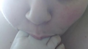 Brunette Beauty Sucks Her Own Toes