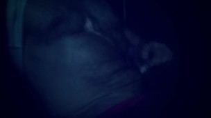 Stroking oiled up cock in the dark
