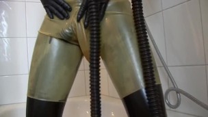 Young Latex Fetish Girl Fully Rubberized With Pisspants And Gasmask