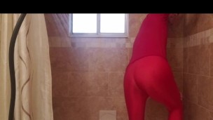 Spandex boy getting showering and jacking off in red catsuit
