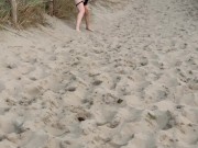 Nervous woman caught peeing in public at the beach 4/16