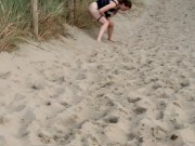 Nervous woman caught peeing in public at the beach 5/16