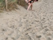Nervous woman caught peeing in public at the beach 7/16