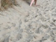 Nervous woman caught peeing in public at the beach 8/16