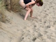 Nervous woman caught peeing in public at the beach 9/16