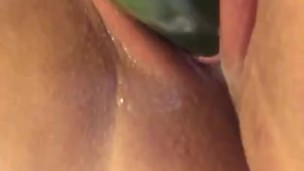 BBW fucks herself with big cucumber