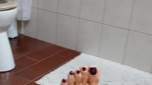 Painting my red toe nails purple! 