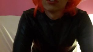 Tranny in bed cum in pants and lick it off!