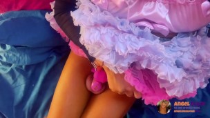 angel black wanks her caged clitty with a wand