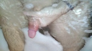 Hot stud jerks off and cums hard while taking a bath