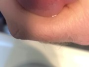 Oiled cock close up with orgasm
