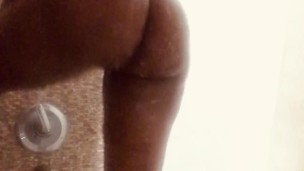 Black ebony shaking her wet soapy ass in shower