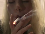 Smoking a cigarette outside
