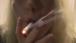 Smoking a cigarette outside