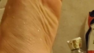 Showing off perfect feet. That will be nice to find someone to suck on them