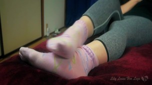 Japanese Girl Plays with Feet in Pink Tabi Socks