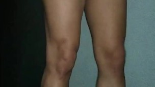sissy in chastity fucks her ass with door knob. She has many dildo