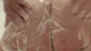 Big soapy ass in shower 