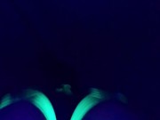 Glowing ebony ass under blacklight