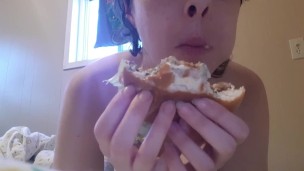 Tattooed Slut Wearing G-String Eats a Sloppy Burger in Bed