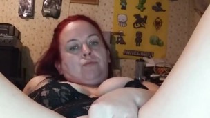 Nasty redheaded slut plays with pussy until she cums