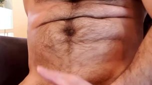 Muscle bear flexes and plays with nipples until he cums!
