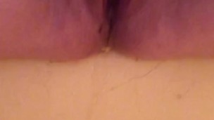 Shy girl pissing in bathtub