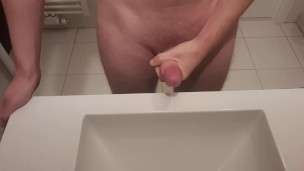 Guy cums in the bathroom sink