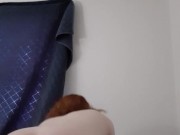 Redhead moaning loudly while masturbating 