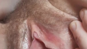 MILF opens pussy and has fun with toy