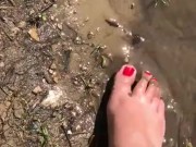 I get my cute little feet filthy in a dirty creek