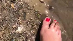 I get my cute little feet filthy in a dirty creek